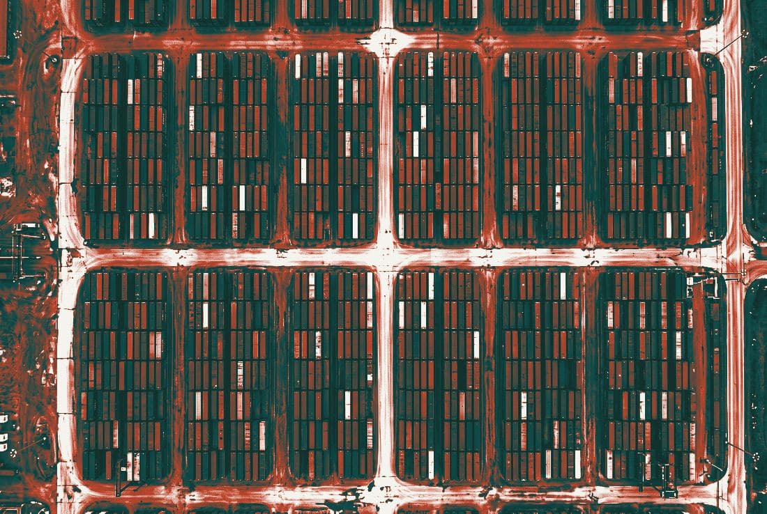 Overhead view of a container storage yard, printed as a two-ink duotone